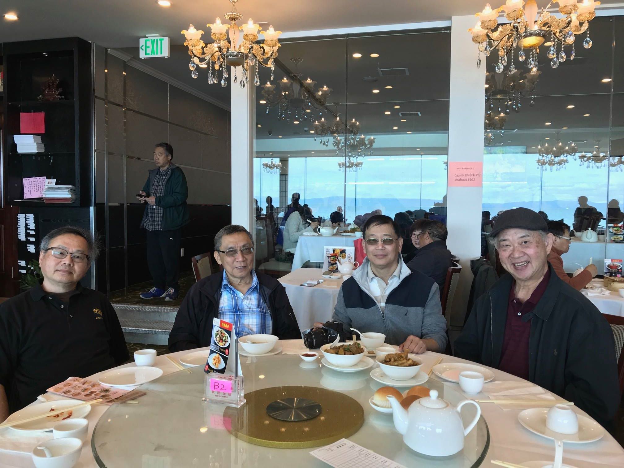 This image has an empty alt attribute; its file name is four-alumni.jpg